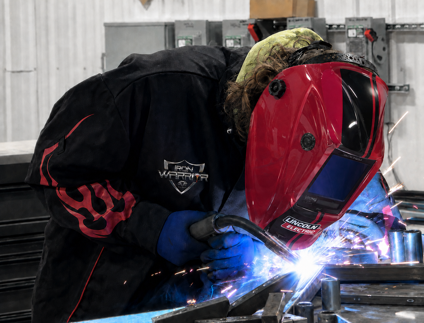 High school student in Iron Warrior apprenticeship program welding
